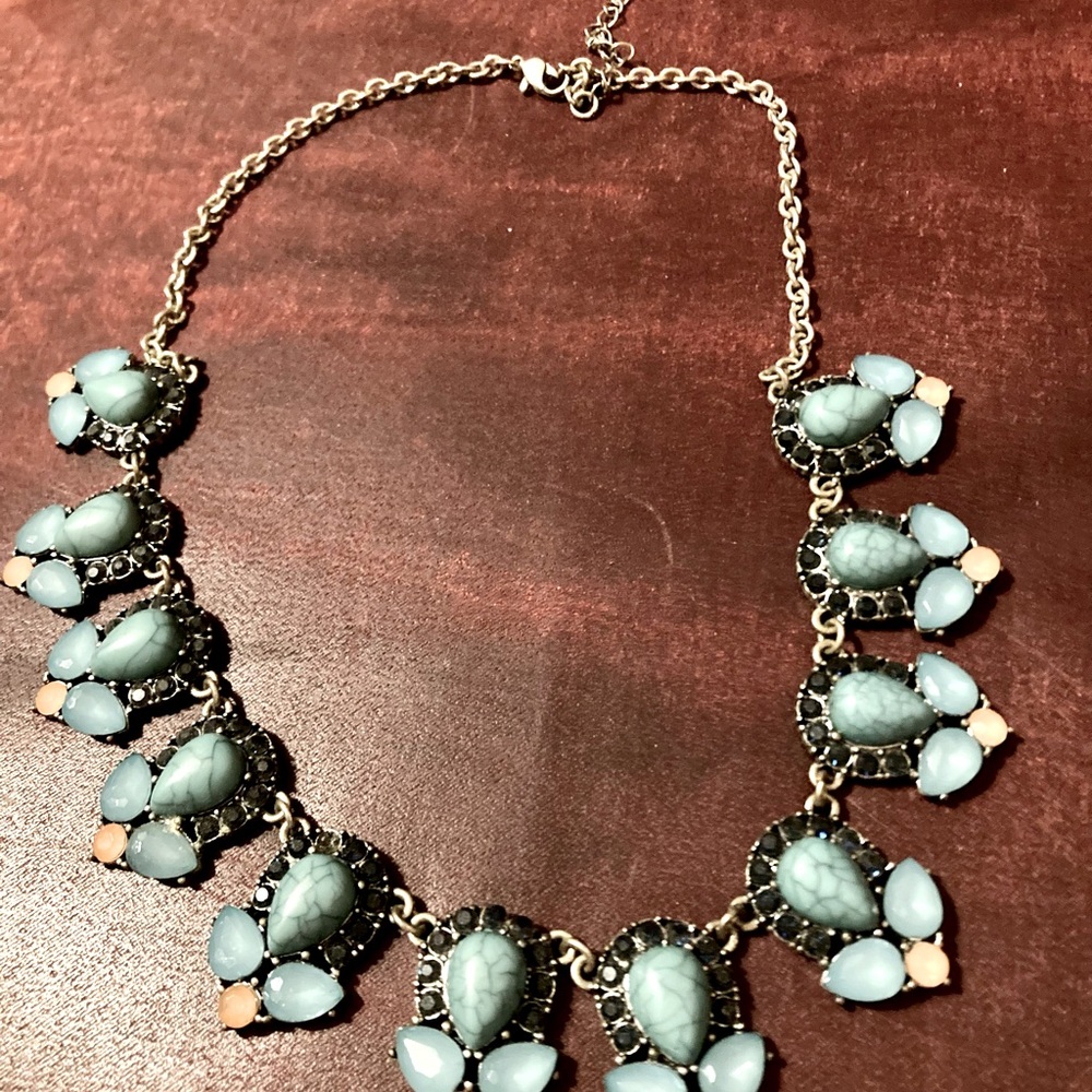 Lovely faux turquoise and moonstone necklace with navy and pink accents.